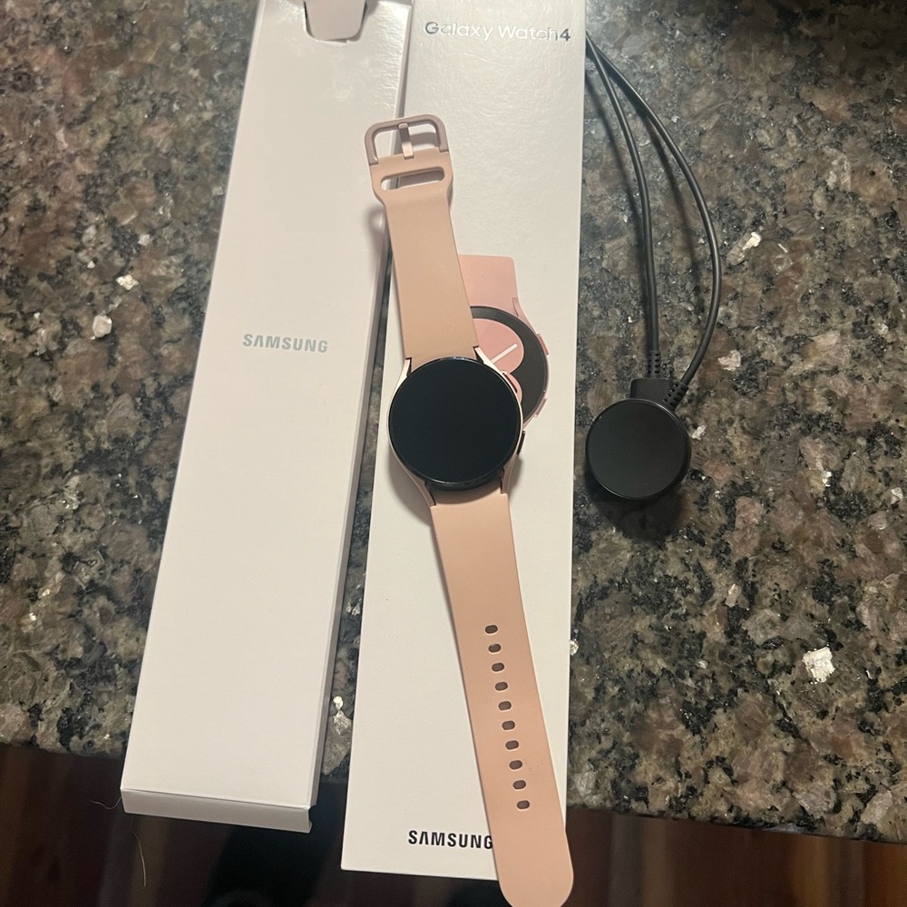 Selling my Samsung Galaxy 4 watch. Comes with charger and original boxes(in pic)